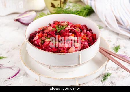 Beet Salad - Vinaigrette in a bowl. Dietary menu. Beet Salad. Salad of beetroot. Vegan food. Traditional ukrainian cuisine. Stock Photo