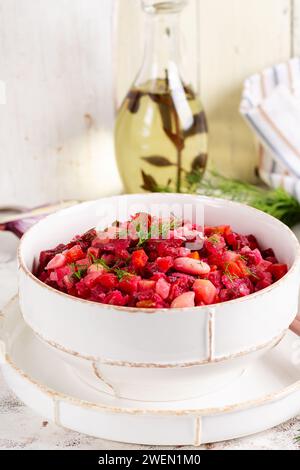 Beet Salad - Vinaigrette in a bowl. Dietary menu. Beet Salad. Salad of beetroot. Vegan food. Traditional ukrainian cuisine. Stock Photo
