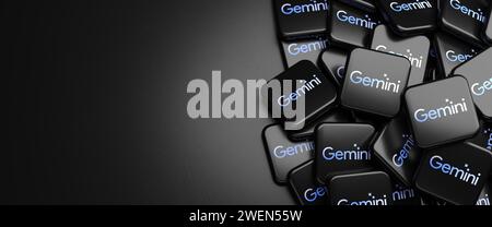 Logos of the Google AI product Gemini on a heap on a table. Copy space Stock Photo