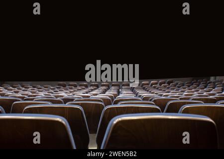 empty theater seats with dark background Stock Photo
