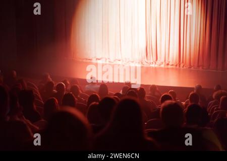 spotlight on red curtains theater stage Stock Photo