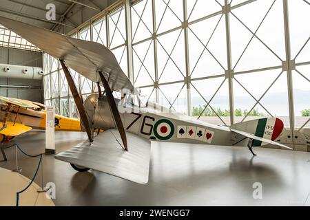 Historic italian military aircraft  in exhibition inside the Italian Airforce Museum´s hangar Stock Photo