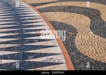 Abstract details of cobbled square with part of Rose Compass at Monument of the Discoveries in Lisbon, Portugal. Stock Photo