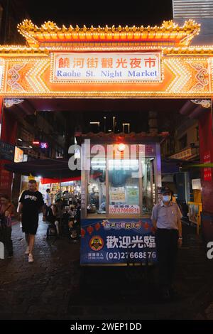 Taipei, Republic of China - October 1, 2023: The colourful and illuminated gate and entrance to the Raohe Street Night Market in the Songshan District Stock Photo