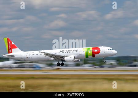 TAP - Air Portugal Airbus A321 With  Aircraft Flag CS-TJE L   lands On The Southern Runway 08R Of Munich Airport MUC EDDM Stock Photo