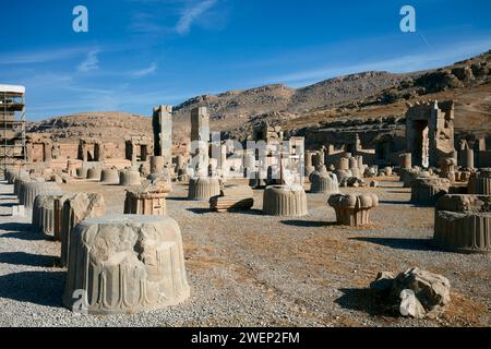 Pieces of fallen ancient columns in Persepolis, ceremonial capital of the Achaemenid Empire (550–330 BC), Iran. Stock Photo