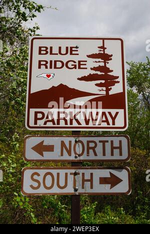 A highway sign near Asheville, North Carolina, hives travelers directions on the scenic Blue Ridge Parkway Stock Photo