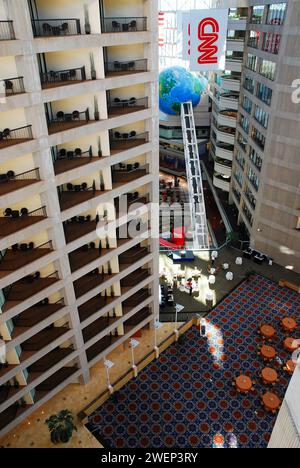 An aerial view, of the upper floors of the hotel, provides a look at the atrium lobby of the CNN building in Atlanta Stock Photo
