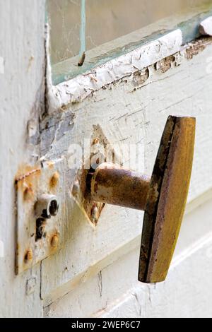 Château-de-Morteau near Cirey-lès-Mareilles, weathered door handle with rust Stock Photo