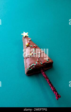 christmas tree shaped chocolate cakes on stick Stock Photo