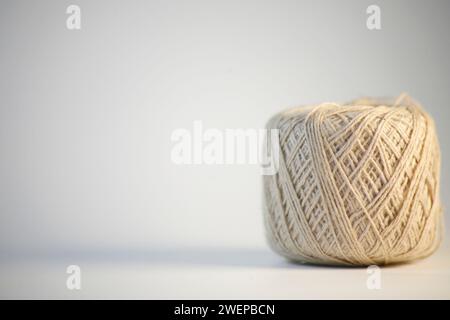Grey ball of threads wool yarn isolated on white background Stock Photo