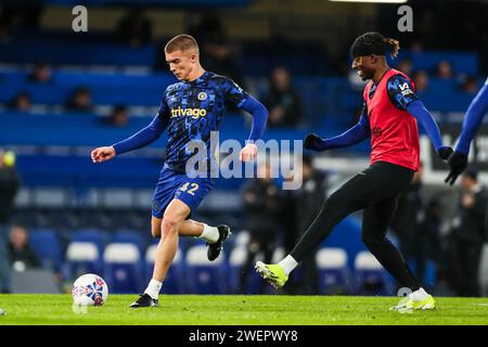 London, UK. 26th Jan, 2024. Chelsea's Alfie Gilchrist (left) and Noni Madueke (right) warming up prior to kick off during the Chelsea FC v Aston Villa FC Emirates FA Cup 4th Round match at Stamford Bridge, London, England, United Kingdom on 26 January 2024 Credit: Every Second Media/Alamy Live News Stock Photo