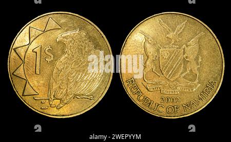 A Golden coin featuring intricate design showcasing Namibian one-dollar coin Stock Photo