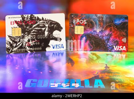 tokyo, japan - jan 27 2024: Close-up of two Japanese Visa EPOS credit cards illustrated with illustrations of Godzilla which is the mascot of Toho cin Stock Photo