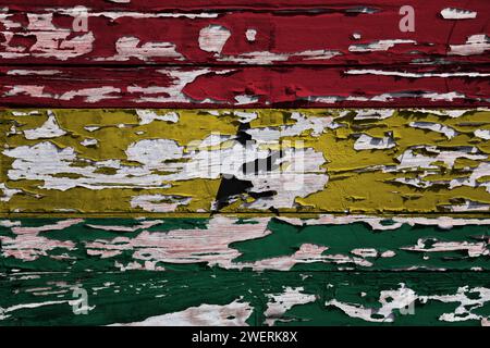 Flag of the Ghana painted on a grunge wooden board. Stock Photo