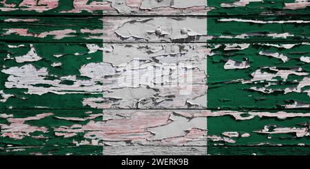 Flag of Nigeria painted on a grunge wooden board. Stock Photo