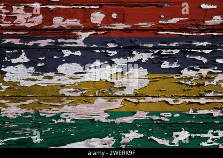Flag of Mauritius painted on a grunge wooden board. Stock Photo