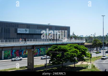 Partial east site view of Maracana train station building with Rei Pele avenue and traffic passing bellow under summer morning sunny clear blue sky. Stock Photo