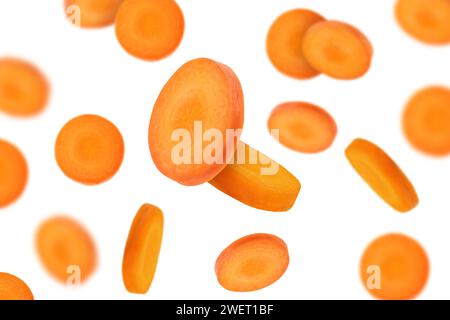Fresh carrot slices falling on white background Stock Photo