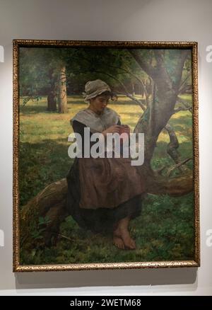 Painting by Jules Breton 'A Peasant Girl Knitting' set for auction as part of Sotheby's Annual Masters Week sales at Sotheby's in New York during a press preview on January 26, 2024 Stock Photo