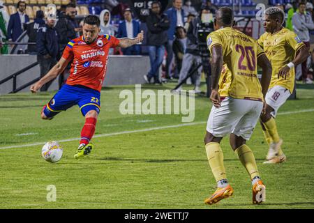 Pasto, Colombia. 26th Jan, 2024. Deportivo Pasto's Israel Alba (L) and Deportes Tolima Junior Hernandez (c-R) and Kevin Perez (R) during the Deportivo Pasto (1) vs Deportes Tolima (4) match at 'La Libertad Stadium' in Pasto, Colombia, January 26, 2024. Photo by: Sebastian Maya/Long Visual Press Credit: Long Visual Press/Alamy Live News Stock Photo