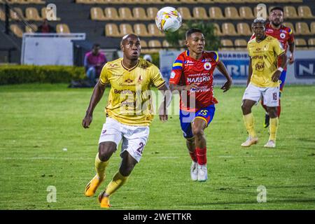 Pasto, Colombia. 26th Jan, 2024. Deportes Tolima Junior Hernandez (L) and Deportivo Pasto's Andres Felipe Amaya (R) during the Deportivo Pasto (1) vs Deportes Tolima (4) match at 'La Libertad Stadium' in Pasto, Colombia, January 26, 2024. Photo by: Sebastian Maya/Long Visual Press Credit: Long Visual Press/Alamy Live News Stock Photo