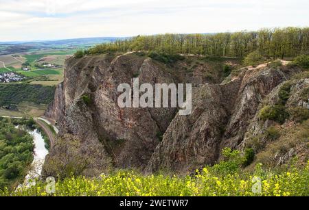 Walking path with trees on top of a cliff at Rotenfels on a spring day in Rhineland Palatinate, Germany. Stock Photo