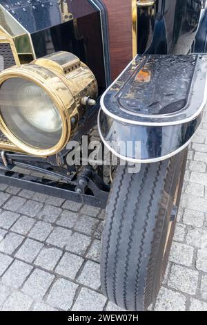 The front fender of a retro car with a headlight on it Stock Photo