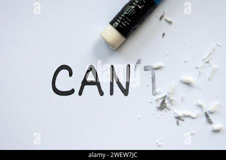 Pencil eraser erasing cannot into can. Motivational and inspirational concept. Stock Photo