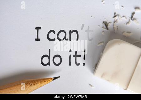 Pencil eraser erasing cannot into can. Inspirational concept. Stock Photo