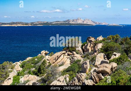 Colourful Mediterranean View of the Rugged Coastline and Eroded Rocks of Northern Sardinia With Isola Caprera; Baia Sardinia Stock Photo