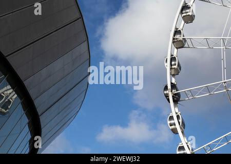 Liverpool, united kingdom January, 16, 2024  M and S Bank Arena and Wheel of Liverpool at King's Dock. Former Echo arena sponsored by Marks and Spence Stock Photo