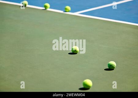 Sport, fitness or tennis balls on court for training, exercise or competitive match to start in summer. Green, background or floor for health or hobby Stock Photo