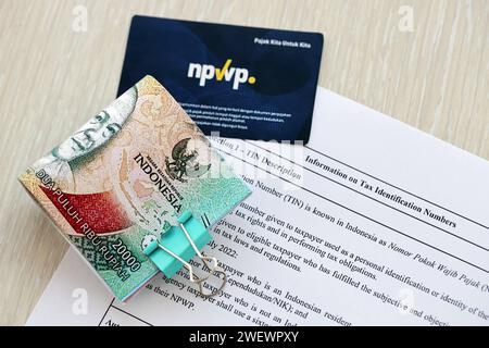 Indonesia NPWP new tax id Number card originally called Nomor Pokok Wajib Pajak. Used to carry out transactions related to taxation for Indonesian taxpayers. Stock Photo