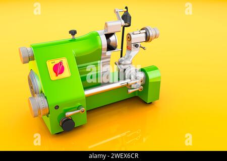 Green Universal Cutter Grinder on yellow background, 3D rendering Stock Photo