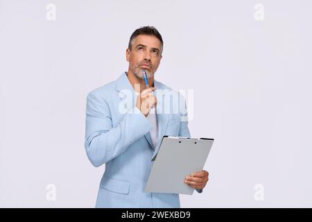 Serious thoughtful mid aged business man thinking isolated on white background. Stock Photo