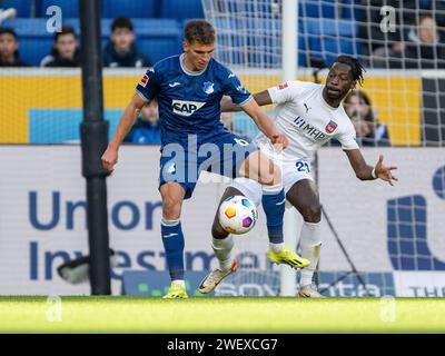 Grischa Proemel (TSG 1899 Hoffenheim, #06), Omar-Haktab Traore (FC Heidenheim, #23), GER, TSG 1899 Hoffenheim vs. 1. FC Heidenheim, Fussball, Bundesliga, 19. Spieltag, Spielzeit 2023/2024, 27.01.2024, DFB/DFL regulations prohibit any use of photographs as image sequences and/or quasi-video., Foto: Eibner-Pressefoto/Sascha Walther Stock Photo