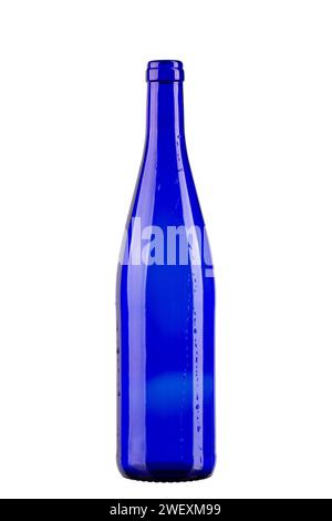Empty blue wine bottle with water drops  isolated on white background. Vertically standing wine bottle. File contains clipping path. Full depth of fie Stock Photo