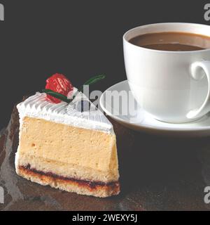A slice of cherry cake and a cup of coffee. Dessert Stock Photo