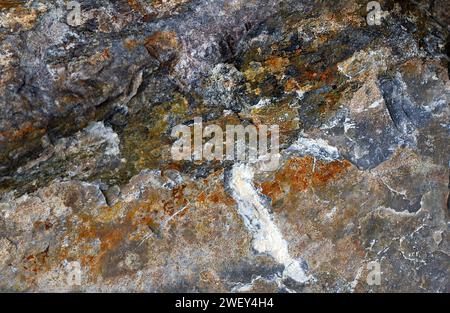 Natural stone colored abstract design with rustic staines and white lines. Textured background. Stock Photo