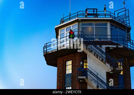 Worker enters control tower at Manchester Barton Aerodrome - City Airport Manchester - in Salford, Greater Manchester Stock Photo