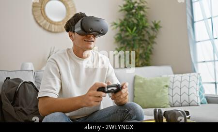 A man in a VR headset comfortably lounging in a chair with his feet up ...