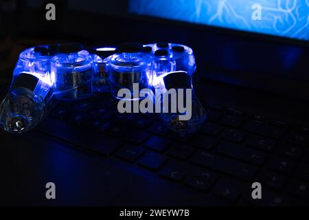 Illuminated gaming controller device for e sports on keyboard Stock Photo