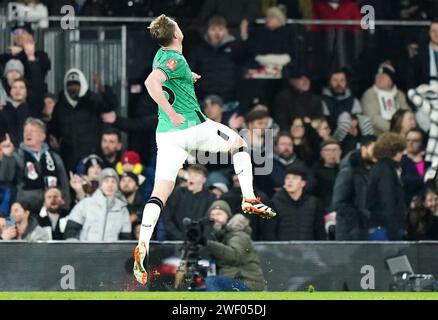 Newcastle United's Sean Longstaff celebrates scoring their side's first goal of the game during the Emirates FA Cup fourth round match at Craven Cottage, London. Picture date: Saturday January 27, 2024. Stock Photo