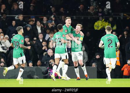 Newcastle United's Sean Longstaff celebrates scoring their side's first goal of the game during the Emirates FA Cup fourth round match at Craven Cottage, London. Picture date: Saturday January 27, 2024. Stock Photo