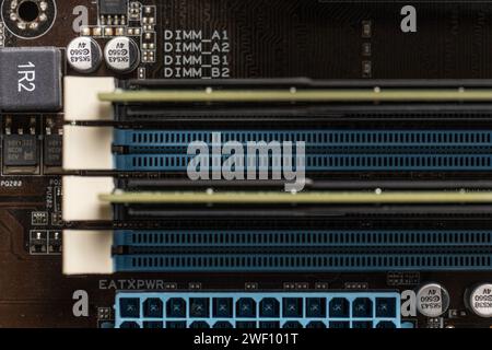 Gothenburg, Sweden - november 12 2022: Looking down two populated DIMM memory slts on a computer motehrboard Stock Photo