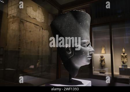 Cairo, Egypt - January 2, 2024: Greywacke stone bust of Userkaf, founder of the Fifth Dynasty Egypt Stock Photo