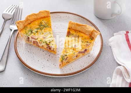 Two slices of ham and cheese quiche, recipe for Easter brunch or breakfast Stock Photo