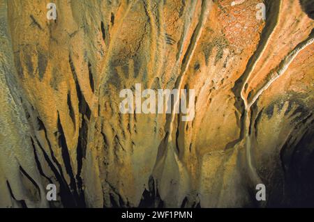 Ancient Maya negative handprint on a flowstone wall, in a cave deep in ...