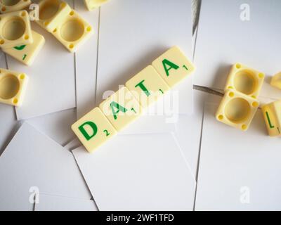 Scrabble letters spelling words DATA. DATA is facts and statistics collected together for reference or analysis Stock Photo